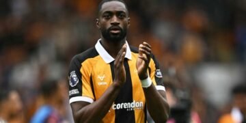 Hull City’s Nigerian defender Semi Ajayi applauds fans on the pitch after the English Premier League football match between Hull City and Manchester United at the MKM Stadium in Kingston upon Hull, eastern England on August 22, 2026. Photo by PAUL ELLIS / AFP