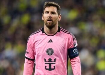 Lionel Messi celebrates with Argentina after his international football