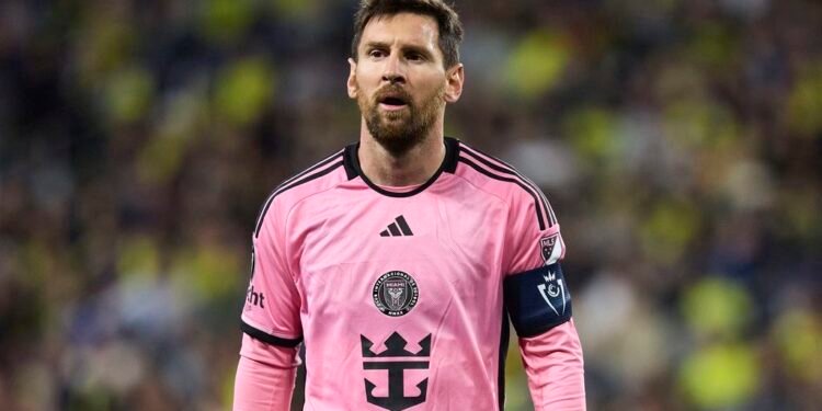 Lionel Messi celebrates with Argentina after his international football