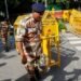 Delhi Police Detain Protesters as ‘Cockroach’ Movement Demonstrates